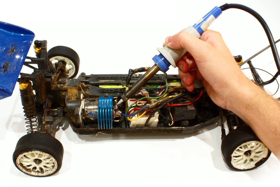 Person fixing an RC car