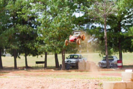 RC car airborne after a ramp jump